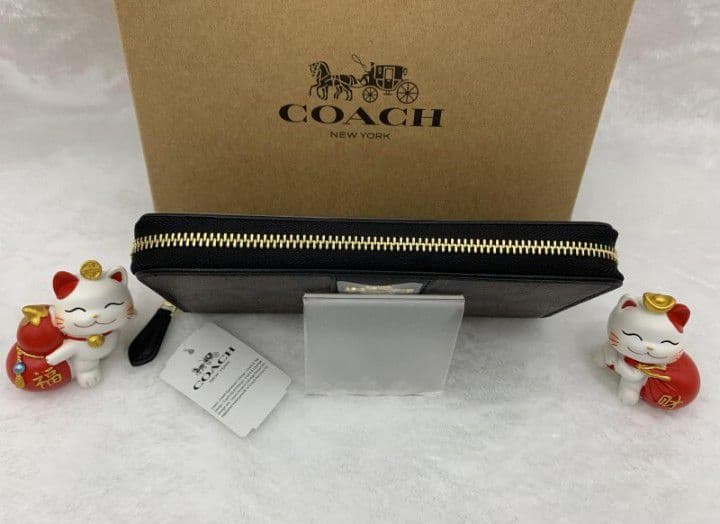 新品未使用コーチ長財布ブラウンブラックシグネチャーレディースメンズ送料無料