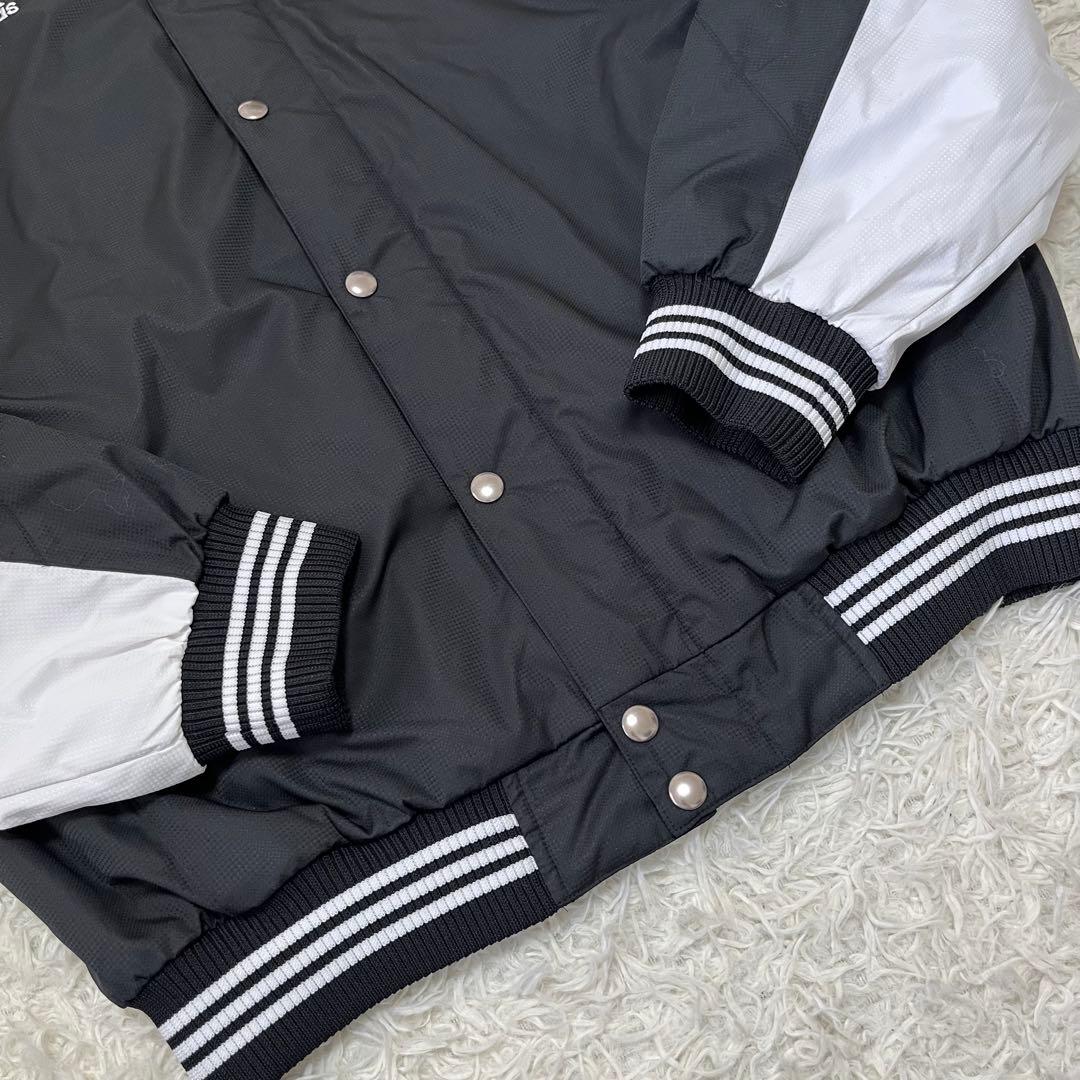 新品タグ付✨アディダスXL ウィンドストッパー スタジャン 中綿ブルゾン　黒　白