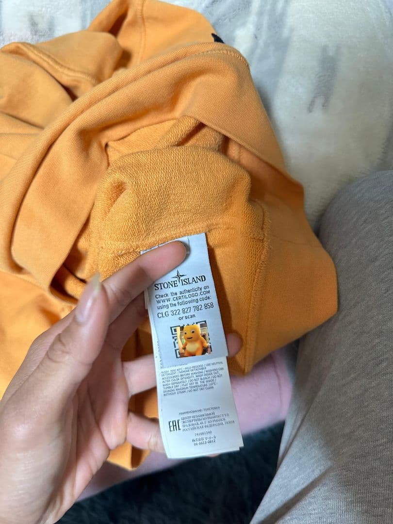 Stone  オレンジ トレーナー