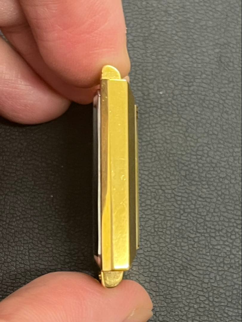 Swiss Exline 金製クォーツ腕時計