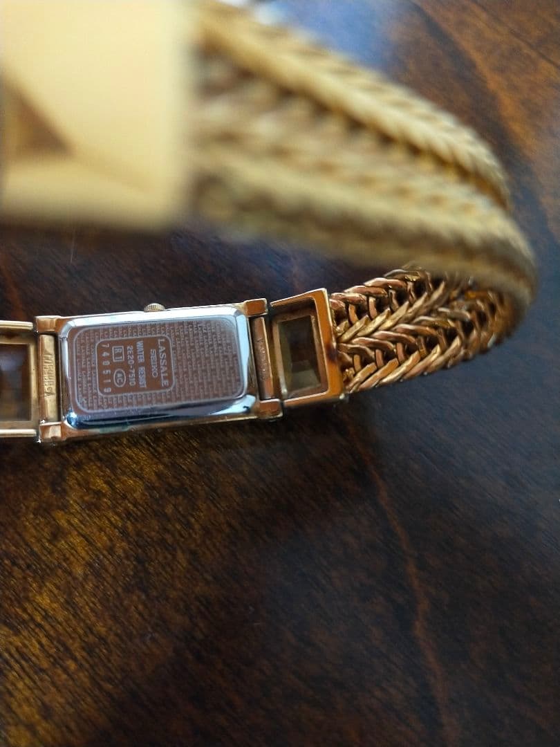 SEIKOのゴールド 編み込みデザイン 腕時計