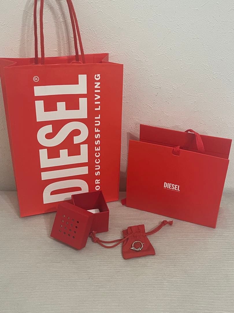 DIESEL ワープピアス シルバー (片耳用) 箱付き