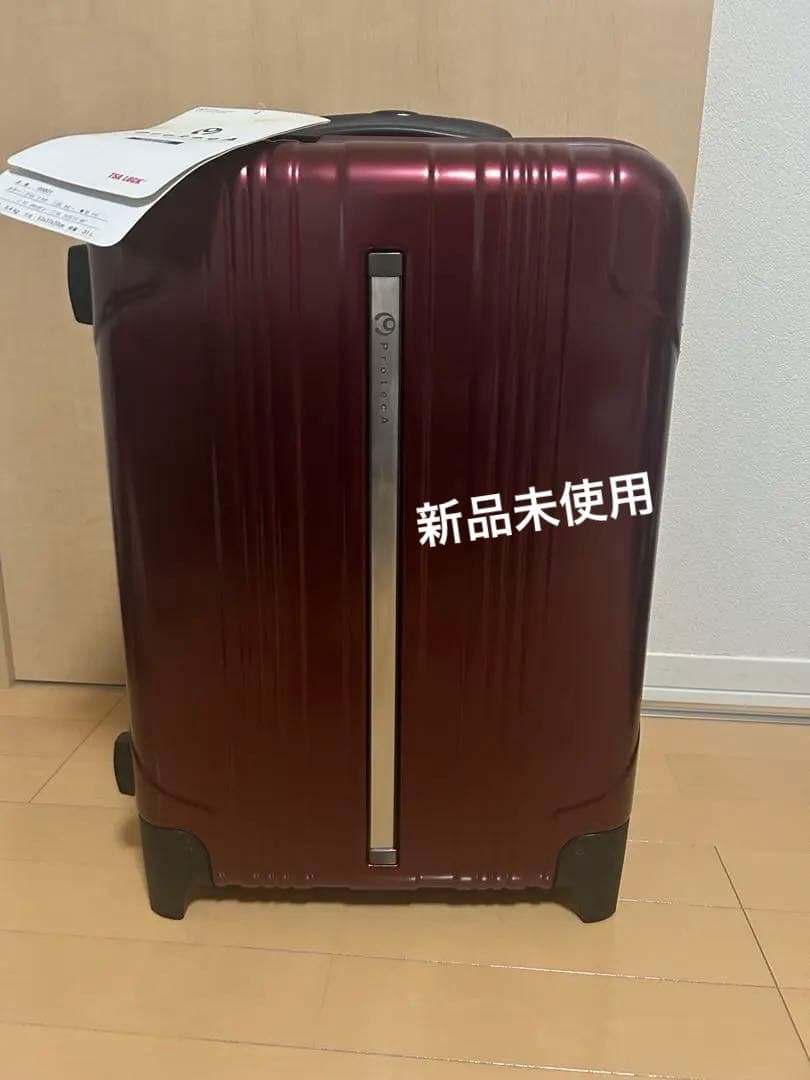 新品未使用タグ付きプロテカ31l★2輪TSAロック付きキャリーケース