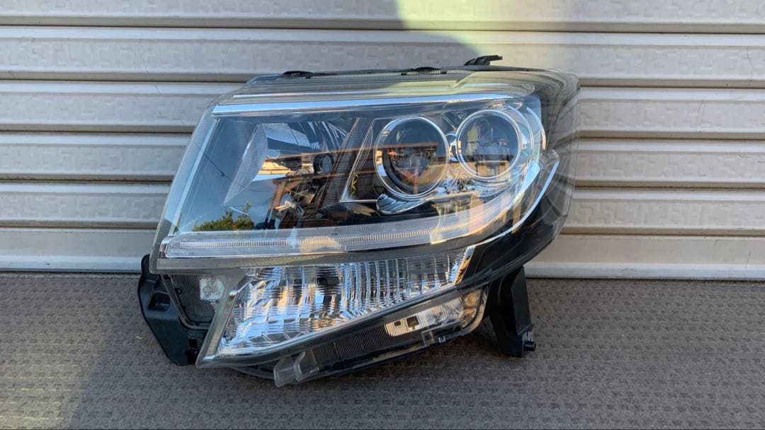 タントカスタム　左ヘッドライト　LA600S