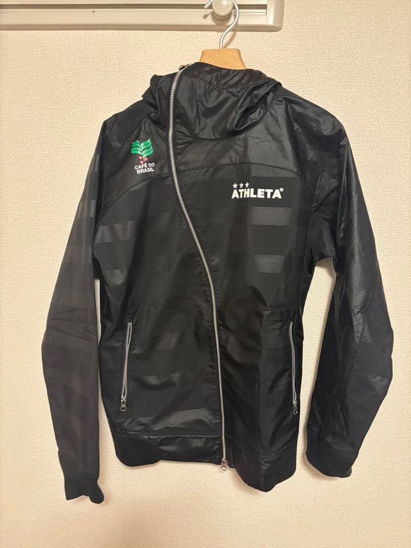 ATHLETA ブラック ピステ ウィンドブレーカー