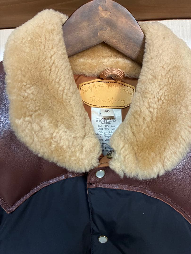 ロッキーマウンテン　ファー付きダウンベスト 黒と茶色