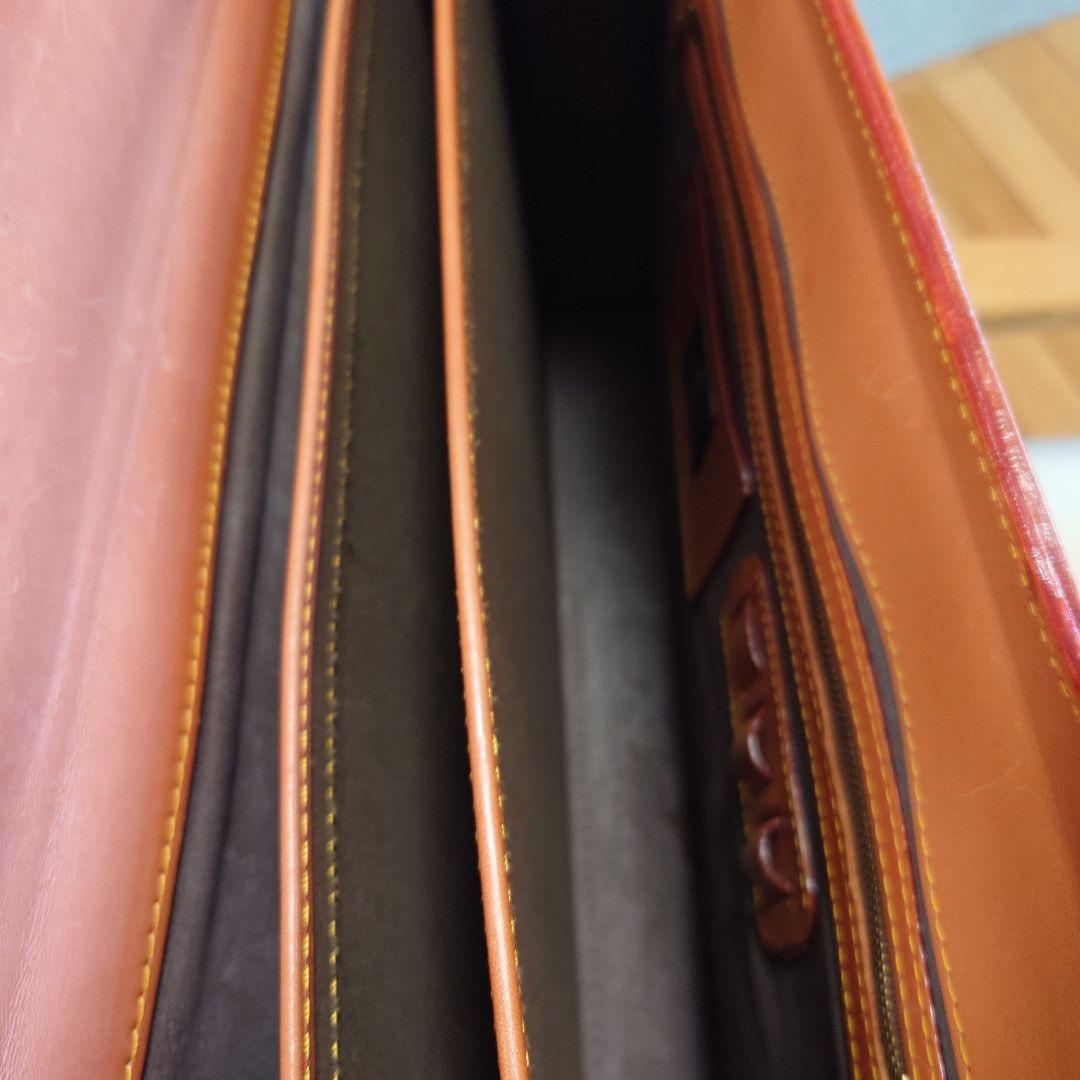 FIVEWOODSオレンジ レザービジネスバッグ（保管袋付き：PRADA）
