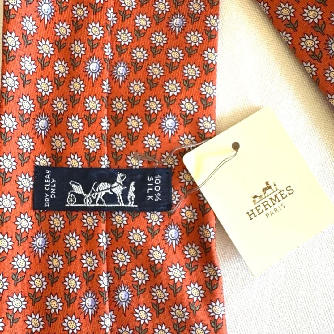 エルメス ネクタイ新品 花柄 オレンジ色 ひまわり柄 太陽柄 おひさま柄