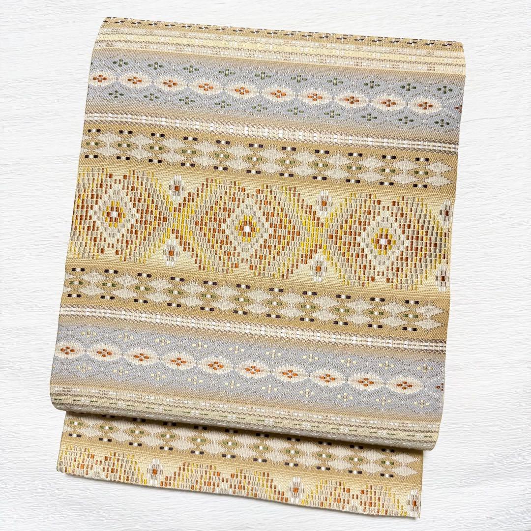 m-22 本場琉球 島花織 幻想雪輪文 袋帯 正絹 2通り 両面 未使用